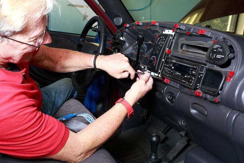 Gary removing factory radio from 2001 Ram